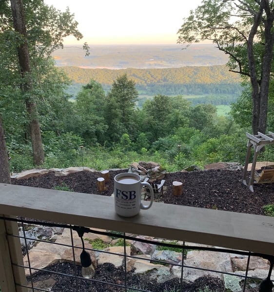 Moutain view with coffee cup.